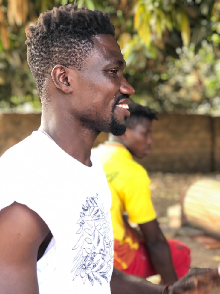 Photo of Namory sitting outside smiling